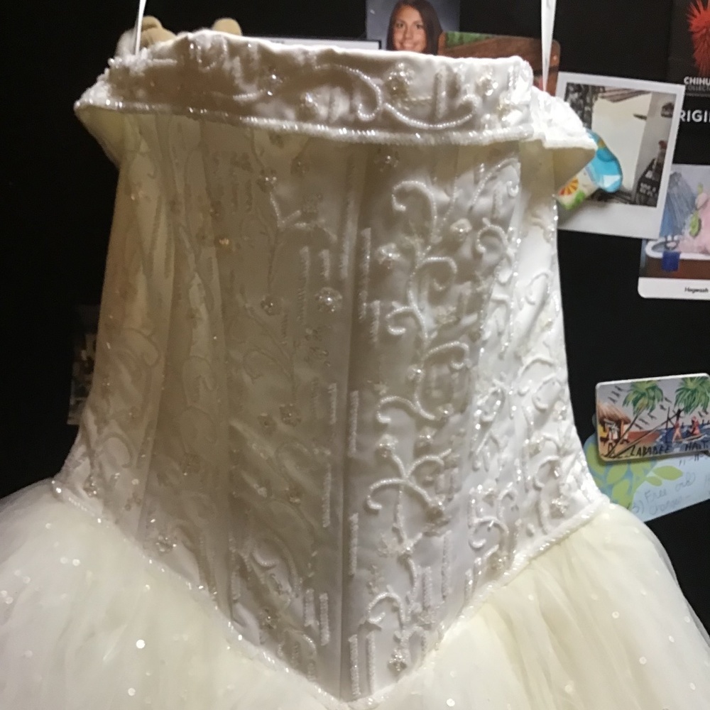 Wedding dress by David’s Bridal size 14